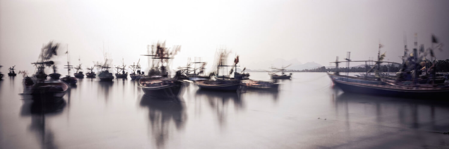 Fishing boats in thailand in motion