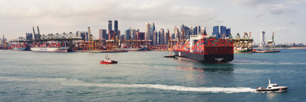 Container ship docking in the port of singapore