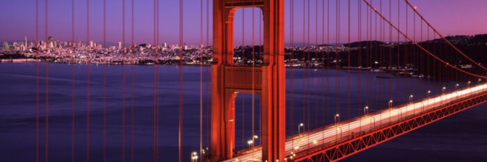 The Golden Gate Bridge with San Francisco City behind at sunset