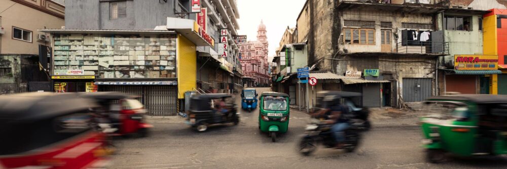 Red Masjid and tuk tuk