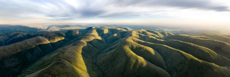 A panoramic aerial print of Howgill fells and the calf in cumbria