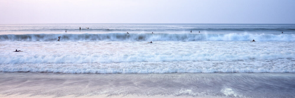 a group of surfers on the wild Atlantic way Ireland