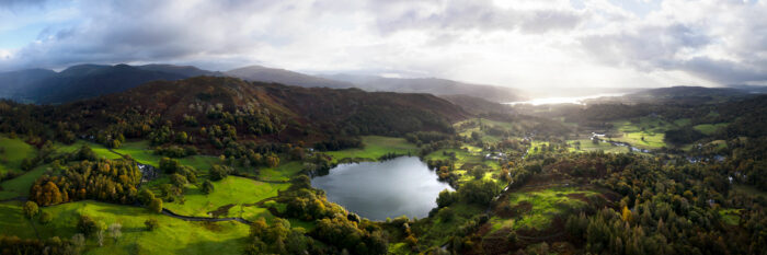 A panoramic print of loughrigg tarn and fell in cumbria