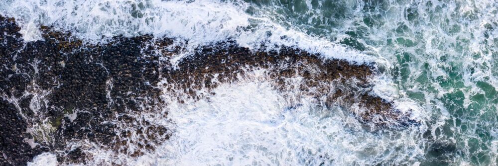 aerial above the giant's causeway on a stormy day