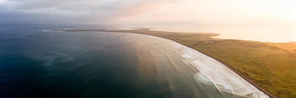 an aerial print of the maherees at sunrise