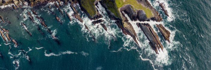 aerial shot or the rugged rocky Irish coast