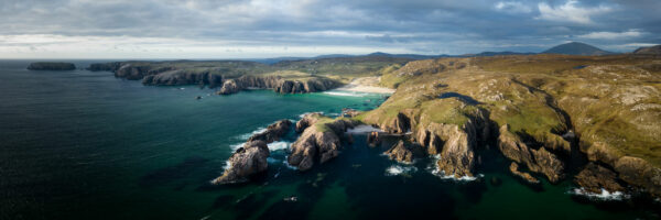 Mangurstadh cliffs and beach aerial in Scotland