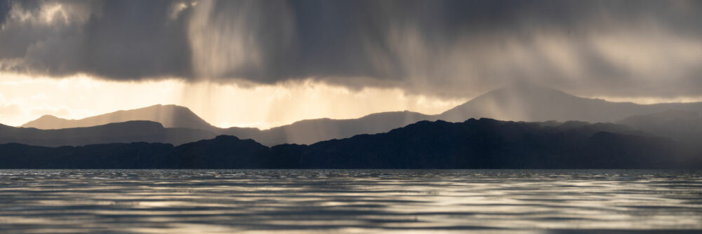 Isles of raasay and sky at sunset