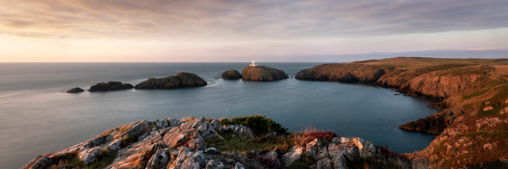 welsh lighthouse united kingdom at sunset