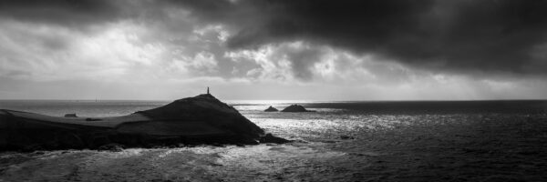 Dramatic black and white panorama of Cape Cornwall along the south west coast path