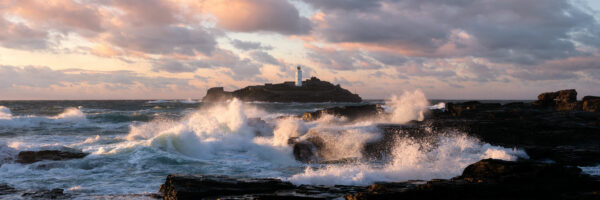 Panorama of the Godrevy Lighthouse at sunset in Cornwall