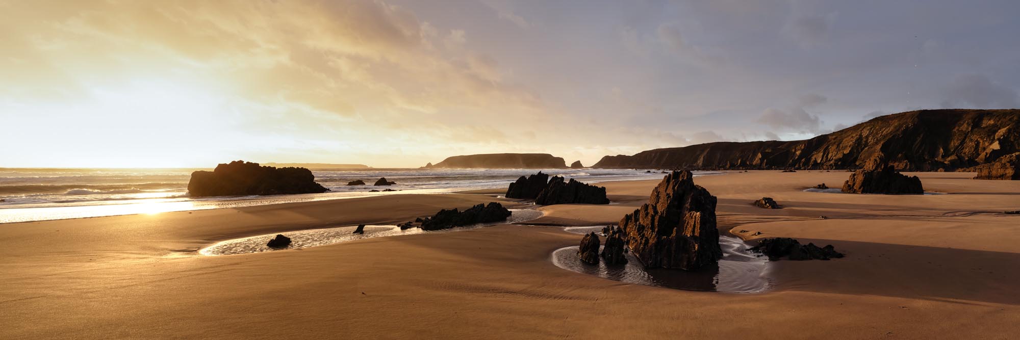 Panorama of Marloes sands beach at sunset on the Pembrokeshire Coast