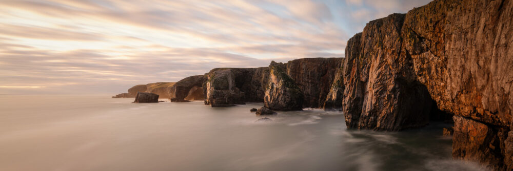 Panorama of the Pembrokeshire Cliffs at sunset at stack rocks and castlemartin