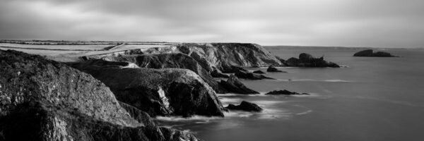 Panorama of Pembrokeshire rugged coast black and white