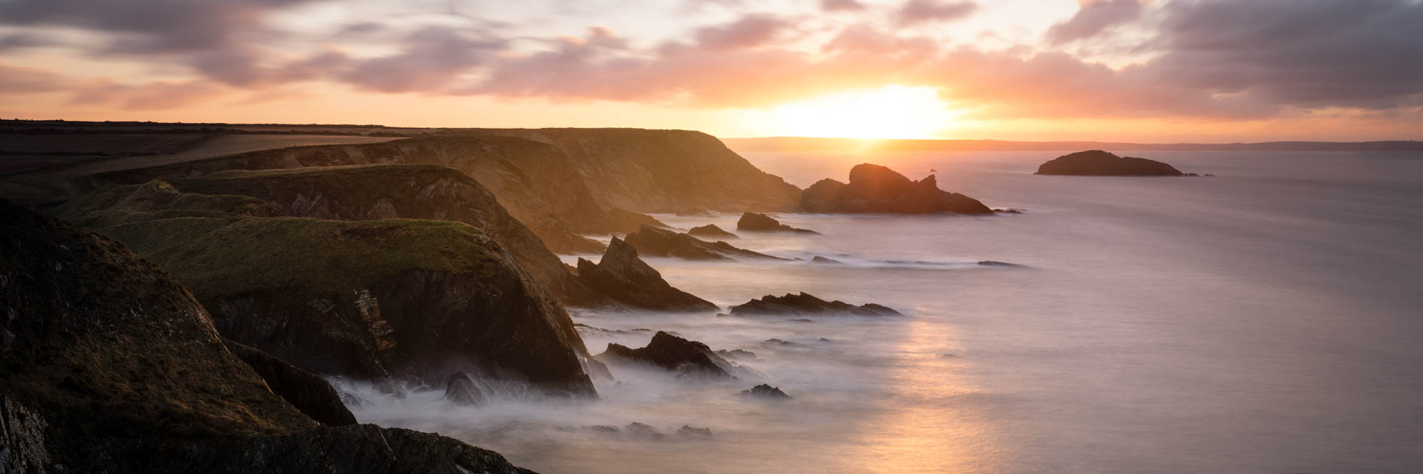 Panorama of St Brides Bay at sunrise on the Pembrokeshire Coast