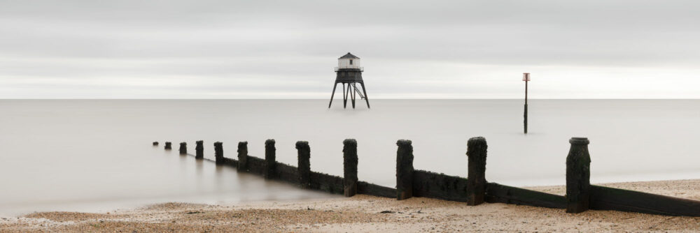 Panorama of Dovercourt beach and lighthouse in Essex east coast of England