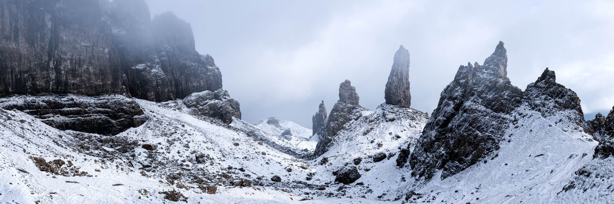Panoramic framed print of the old man of Storr oil winter covered in snow on the Isle of Skye