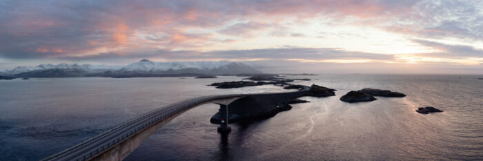Aerial Panorama of The Atlantic Ocean road at sunset in Norway