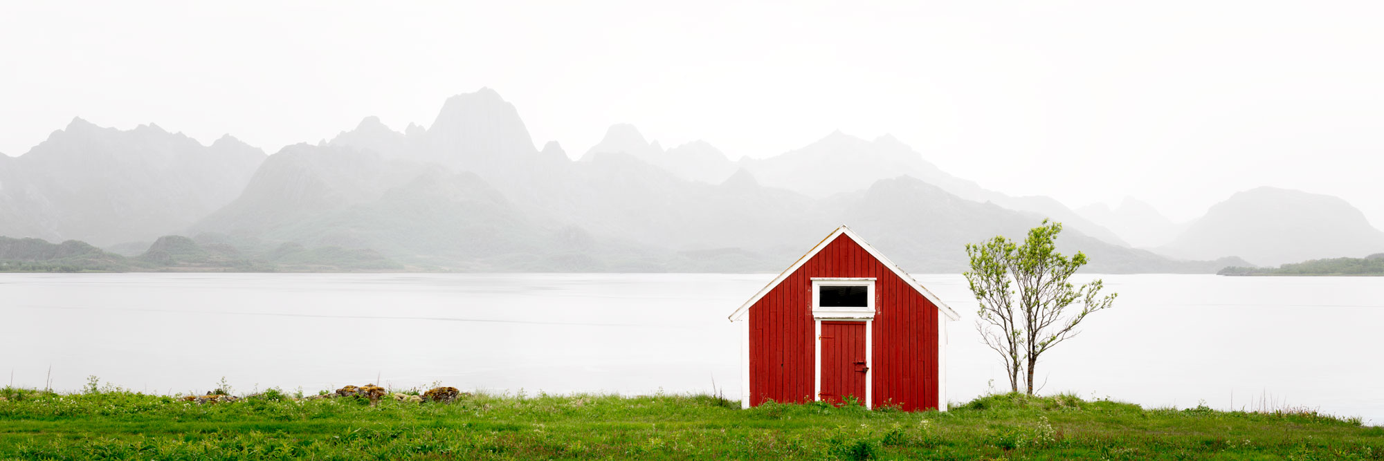Panorama of a Norwegian red hut in Vesterålen