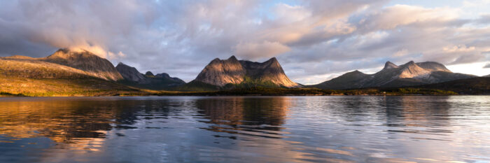 Panorama of the calm water and mountains of Efjoden in Nordland, Norway