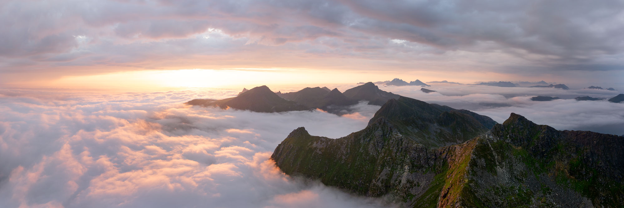 Aerial Panorama of. cloud inversion on Flakstadøya island in the Lofoten Islands in the Arctic Circle