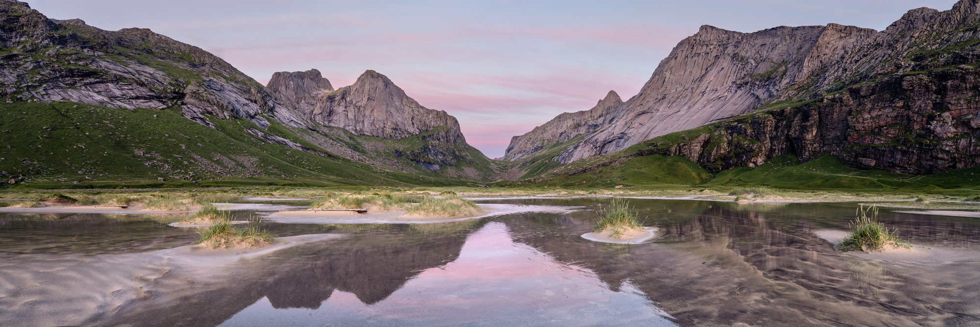 Panorama of Horseid Beach sand dunes at dawn Lofoten Islands