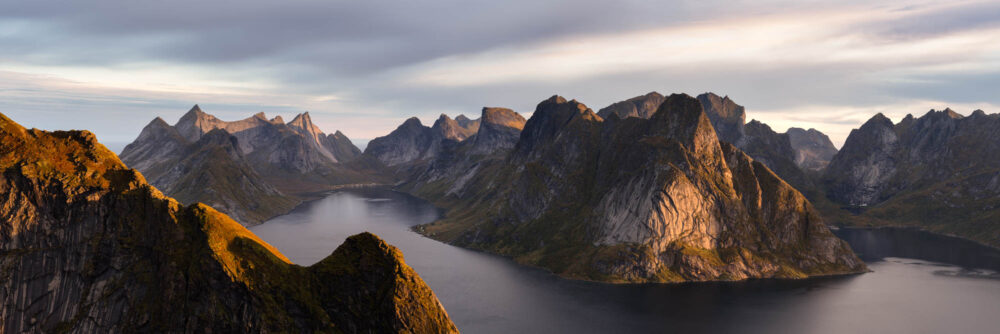 Panorama of Reinefjord at sunrise from Reinebringen mountain in the Lofoten Islands