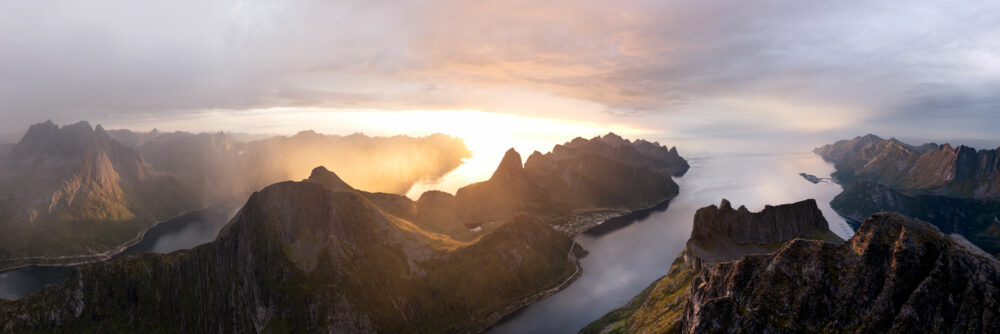 Aerial panorama of Øyfjorden Fjord on Senja island at sunset in Norway