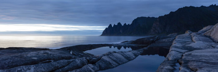 Panarama of the Tungeneset coast along Ersfjord with the Oksehornan behind on Senja Island Norway