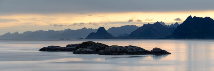 Panorama of the Mountains of the Lofoten Islands in Silhouette from Henninsvaer