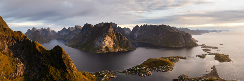 Panorama of Reinefjord at sunrise from Reinebringen mountain in the Lofoten Islands