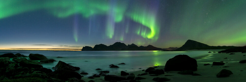 Panorama of the Aurora over a beach in the Lofoten Islands