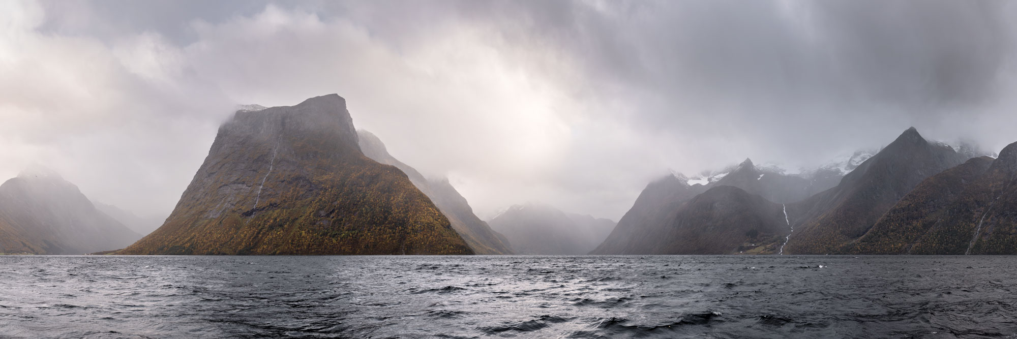 Panorama of Hjørundfjord during a stormy autumn day in Norway