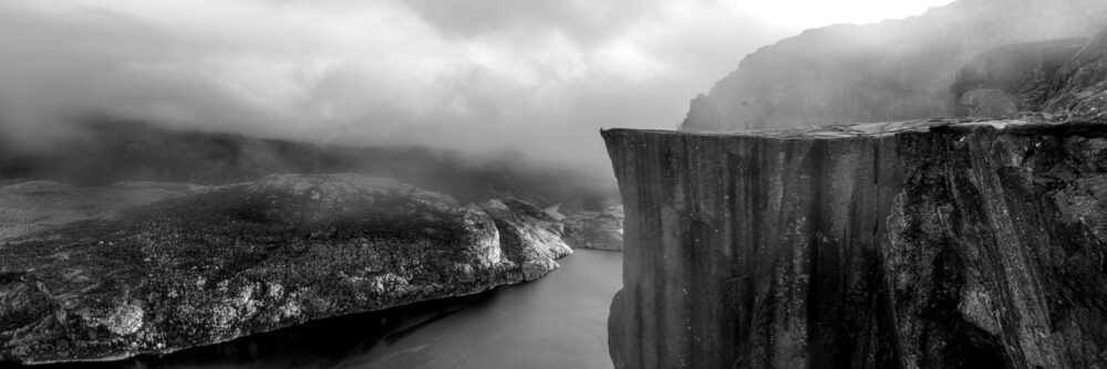 Black and white panorama of Pulpit rock above Lysefjorden in Norway