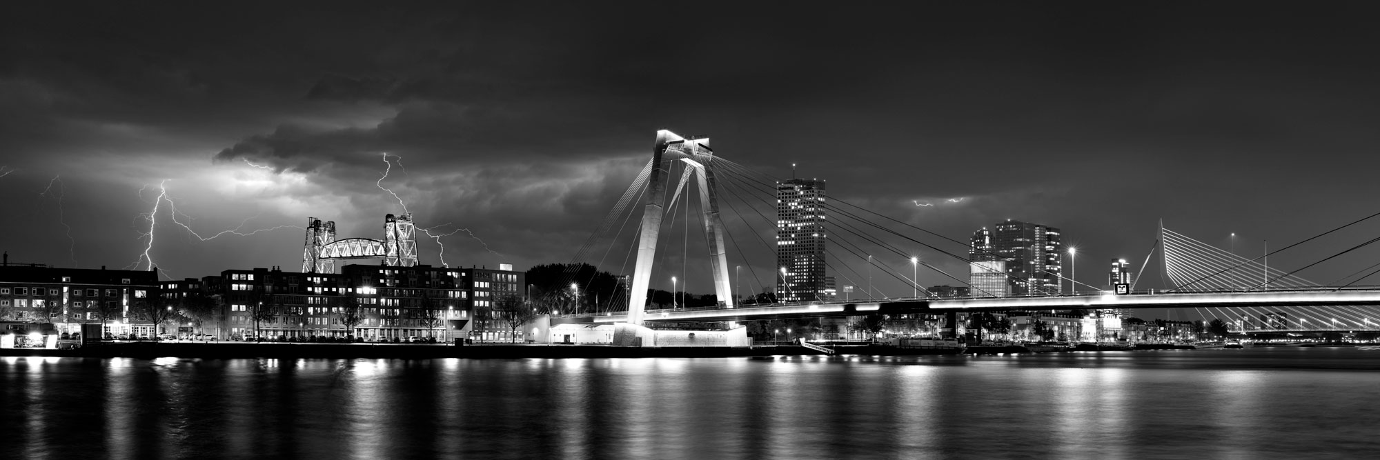 Black and white panorama of a lightning storm over Rotterdam City