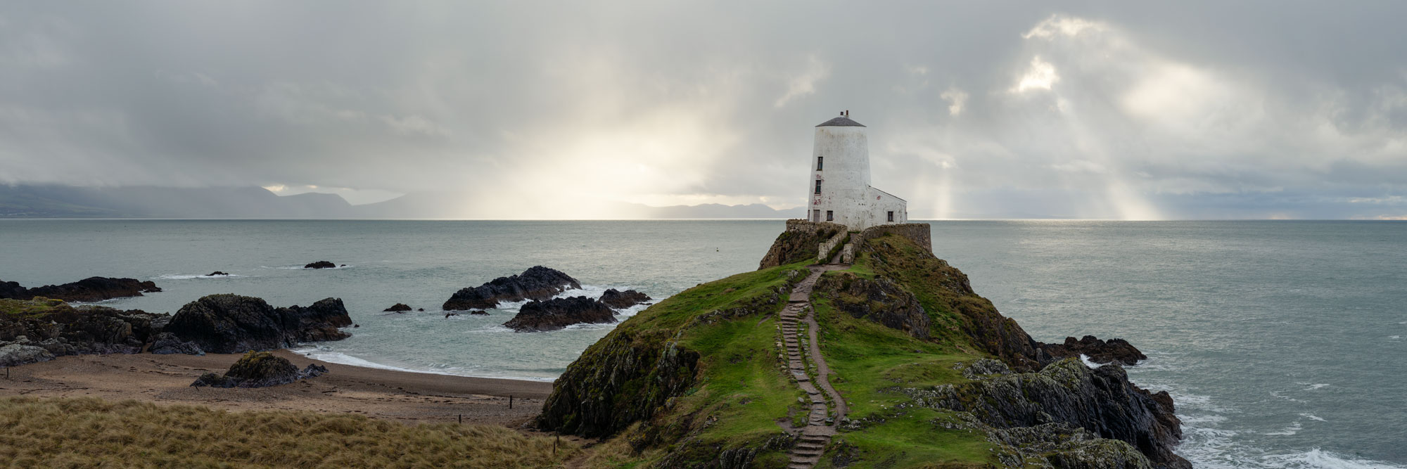 Panorama of a Anglesey Lighthouse on Ynys Llanddwyn Island in Wales