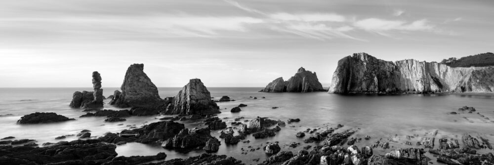 B&W panorama of the Silence beach in Spain