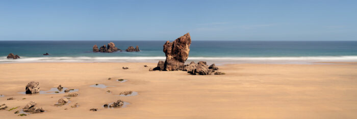 Panorama of the Aguilar beach on a sunny day in the North Coast of Spain