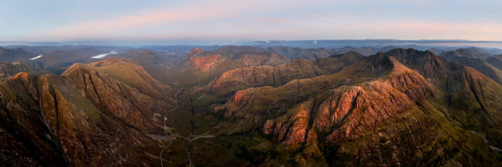 Aerial Panoramic art print of Glencoe and the three sisters at sunset in Scotland