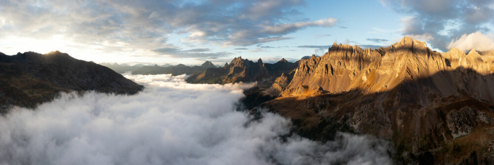 Aerial Panorama above a cloud inversion in the Vallée de la Clarée, France