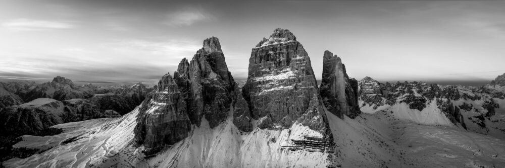 Monochrome aerial panorama of Tre cime di lavaredo in the Italian Dolomites