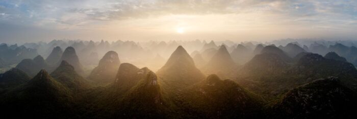 Aerial panorama of sunset amongst the Karst mountains of Guilin