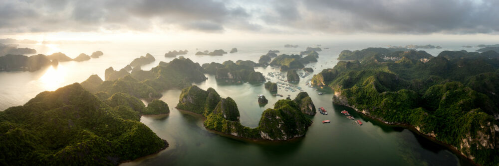 Aerial panorama of Ha Long Bay and Lan Ha Bay at sunrise in Vietnam