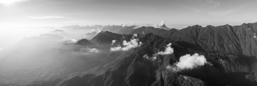 Black and white Aerial Panorama of the Lien son Mountain range and Fiansipan at sunrise in Sapa Vietnam