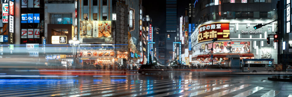 Panorama of a Shinjuku Crossing in Tokyo Japan at night