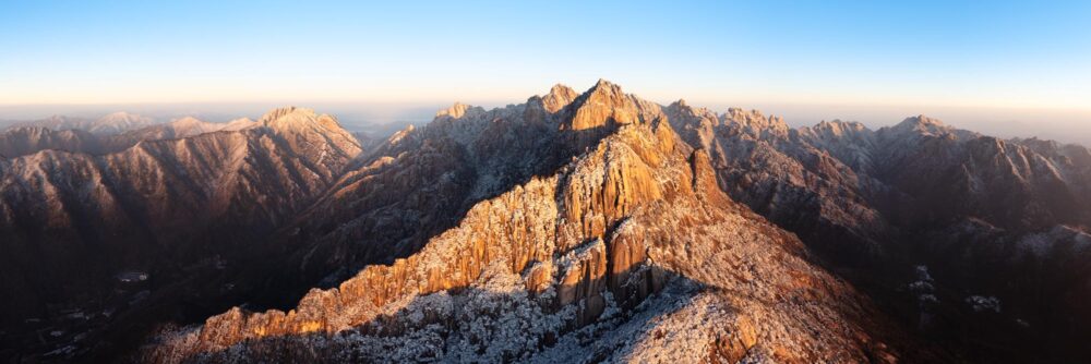 Aerial Panorama of the Huangshan Yellow Mountains in China at sunrise in winter